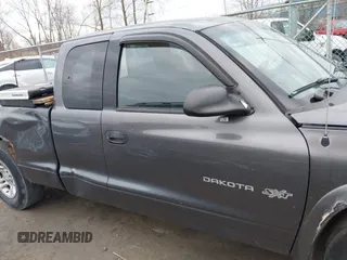 2002 Dodge Dakota with VIN 1B7GL12X22S644306, listed as a IAAI auction lot 41826999 with 198,069 mi miles and . Bid and sale history available at carsss.com. Image 13.