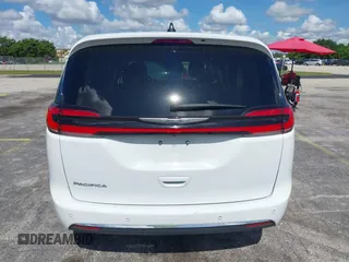 2023 Chrysler Pacifica Touring L z VIN 2C4RC1BG8PR566745, wystawiony jako IAAI lot #42579405 z przebiegiem 46 228 mil mil oraz . Historia ofert i sprzedaży dostępna na DreamBid. Obrazek 16.