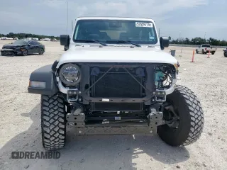 2022 Jeep Wrangler Sport S with VIN 1C4GJXAG5NW259605, listed as a Copart auction lot 57659775 with 14,864 mi miles and Salvage title. Bid and sale history available at DreamBid. Image 5.