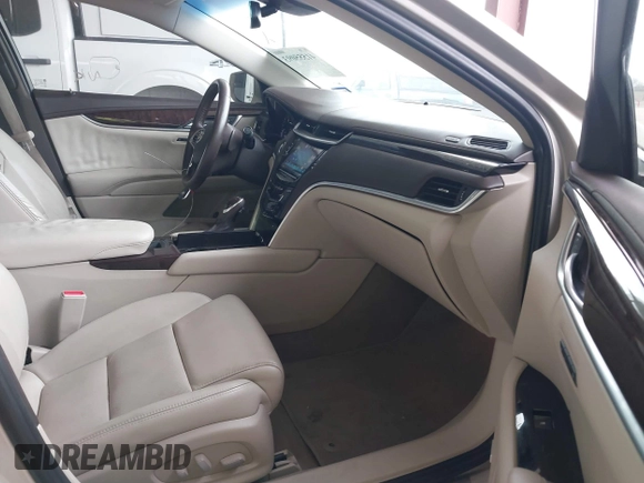 2015 Cadillac XTS Luxury z VIN 2G61M5S39F9246298, wystawiony jako IAAI lot #41555093 z przebiegiem 126 928 mil mil oraz . Historia ofert i sprzedaży dostępna na DreamBid. Obrazek 5.