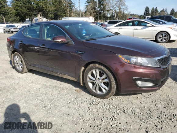 2012 Kia Optima EX with VIN 5XXGN4A77CG083612, listed as a Copart auction lot 52827145 with 143,790 mi miles and Salvage Title. Bid and sale history available at carsss.com. Image 4.