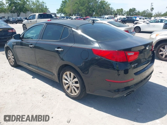 2014 Kia Optima EX with VIN 5XXGN4A72EG294381, listed as a IAAI auction lot 41944473 with 119,781 mi miles and . Bid and sale history available at carsss.com. Image 3.