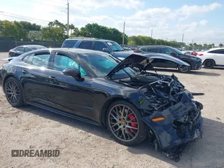 2021 Porsche Panamera GTS with VIN WP0AG2A74ML147997, listed as a IAAI auction lot 42103486 with 10,517 mi miles and . Bid and sale history available at DreamBid. Image 1.