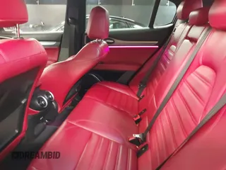 2020 Alfa Romeo Stelvio Ti z VIN ZASPAKBN9L7C92041, wystawiony jako IAAI lot #41329129 z przebiegiem 47 977 mil mil oraz . Historia ofert i sprzedaży dostępna na DreamBid. Obrazek 8.