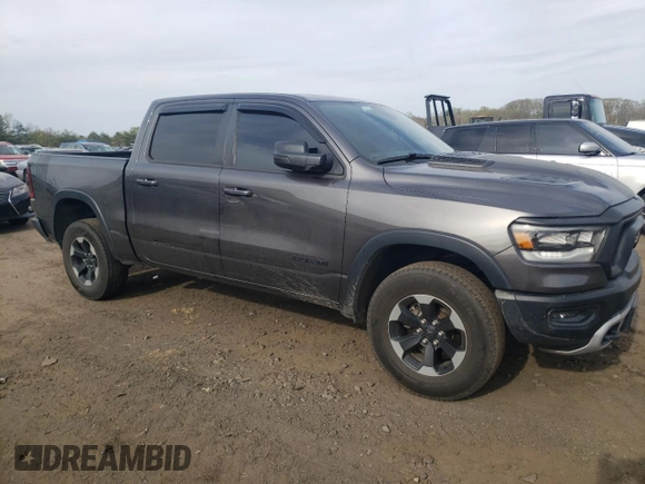 2020 Ram 1500 Rebel with VIN 1C6SRFLT5LN154225, listed as a Copart auction lot 53859515 with 88,907 mi miles and Salvage title. Bid and sale history available at DreamBid. Image 4.