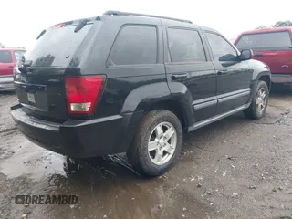2007 Jeep Grand Cherokee Laredo with VIN 1J8GS48K57C516037, listed as a IAAI auction lot 41982692 with 273,961 mi miles. Bid and sale history available at carsss.com. Image 4.
