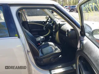 2013 MINI Countryman with VIN WMWZB3C56DWR36117, listed as a IAAI auction lot 42076676 with 168,750 mi miles and . Bid and sale history available at DreamBid. Image 5.