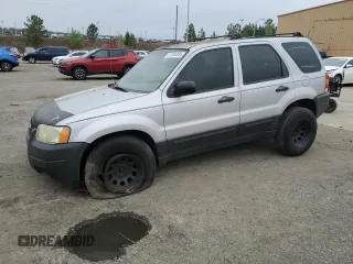 2003 Ford Escape XLS Popular with VIN 1FMYU02173KB43156, listed as a Copart auction lot 51534495 with 266,600 mi miles and Salvage title. Bid and sale history available at DreamBid. Image 1.