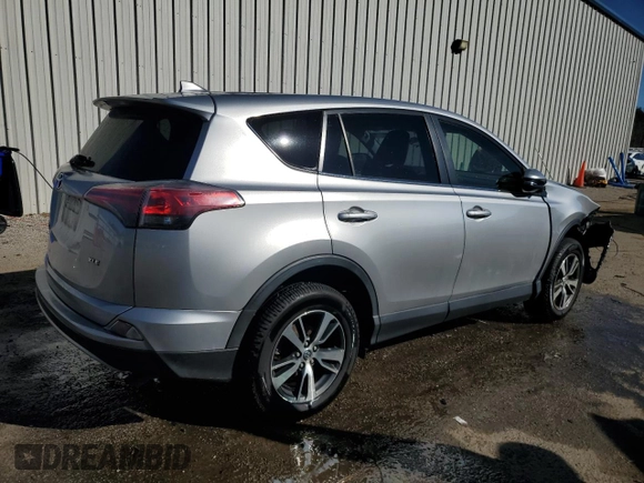 2018 Toyota RAV4 XLE with VIN JTMWFREV1JJ205906, listed as a Copart auction lot 84700564 with 64,953 mi miles and Salvage Title. Bid and sale history available at DreamBid. Image 3.