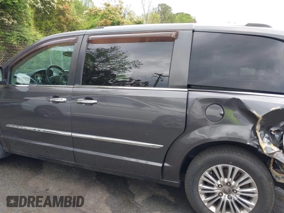 2014 Chrysler Town & Country Touring L with VIN 2C4RC1CG6ER195502, listed as a IAAI auction lot 42009629 with 126,157 mi miles and . Bid and sale history available at DreamBid. Image 14.