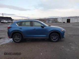 2019 Mazda CX-5 Sport with VIN JM3KFBBM5K0668678, listed as a IAAI auction lot 41811146 with 102,634 mi miles and . Bid and sale history available at DreamBid. Image 13.