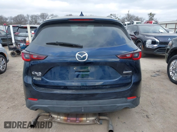 2023 Mazda CX-5 S Carbon Edition z VIN JM3KFBCM4P0288155, wystawiony jako IAAI lot #41501030 z przebiegiem 26 516 mil mil oraz . Historia ofert i sprzedaży dostępna na DreamBid. Obrazek 16.