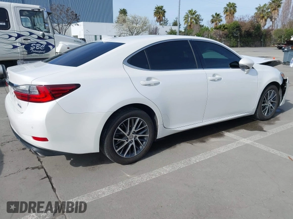 2016 Lexus ES with VIN JTHBK1GGXG2243002, listed as a IAAI auction lot 41840675 with 79,544 mi miles. Bid and sale history available at carsss.com. Image 4.