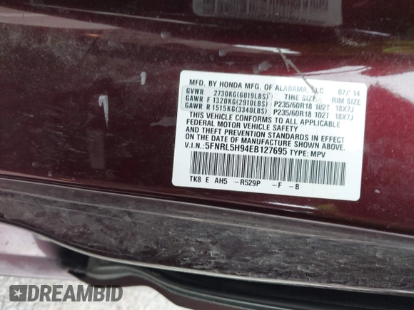 2014 Honda Odyssey Touring with VIN 5FNRL5H94EB127695, listed as a IAAI auction lot 41936109 with 221,786 mi miles and . Bid and sale history available at DreamBid. Image 9.