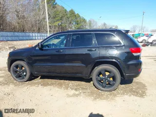 2015 Jeep Grand Cherokee Altitude with VIN 1C4RJFAG1FC628336, listed as a IAAI auction lot 41654598 with 187,359 mi miles. Bid and sale history available at carsss.com. Image 14.
