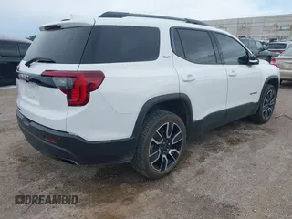 2021 GMC Acadia SLT with VIN 1GKKNMLS3MZ176996, listed as a IAAI auction lot 42475945 with 82,571 mi miles and . Bid and sale history available at DreamBid. Image 4.