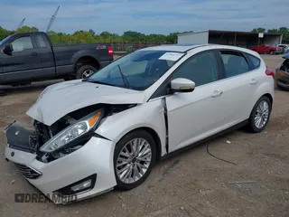 2015 Ford Focus Titanium with VIN 1FADP3N22FL365477, listed as a IAAI auction lot 37461727 with Not provided miles and . Bid and sale history available at DreamBid. Image 2.