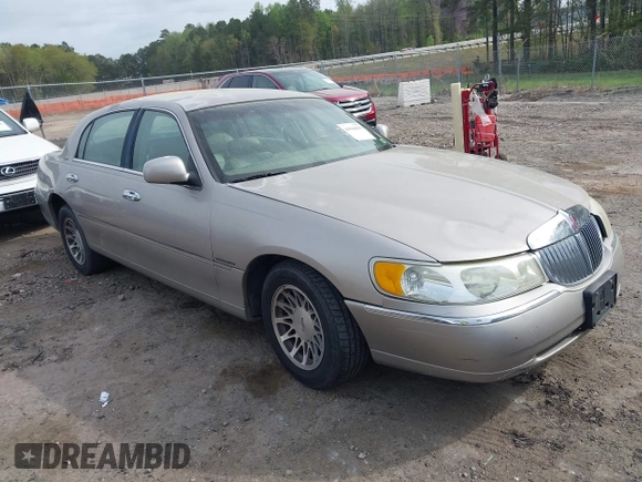 2001 Lincoln Town Car Signature with VIN 1LNHM82W21Y684197, listed as a IAAI auction lot 41944429 with 159,297 mi miles and . Bid and sale history available at DreamBid. Image 1.