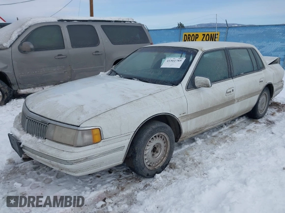 1991 Lincoln Continental with VIN 1LNCM9745MY632946, listed as a IAAI auction lot 41561785 with 124,186 mi miles and . Bid and sale history available at DreamBid. Image 2.
