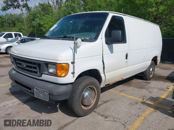 2004 Ford Econoline Cargo with VIN 1FTNE24L94HB46878, listed as a IAAI auction lot 42223765 with 261,454 mi miles and . Bid and sale history available at DreamBid. Image 2.