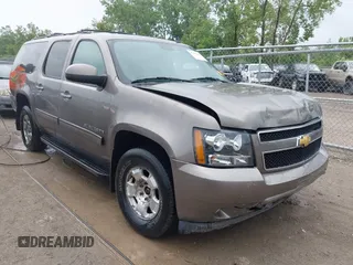 2013 Chevrolet Suburban LT with VIN 1GNSKJE7XDR107421, listed as a IAAI auction lot 42485610 with 97,472 mi miles and . Bid and sale history available at DreamBid. Image 1.