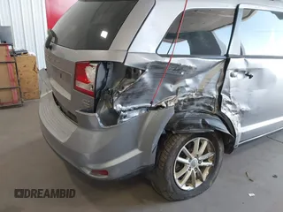 2015 Dodge Journey SXT z VIN 3C4PDCBG1FT587061, wystawiony jako IAAI lot #42186693 z przebiegiem 186 551 mil mil oraz . Historia ofert i sprzedaży dostępna na DreamBid. Obrazek 6.