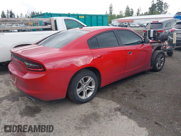 2015 Dodge Charger SE z VIN 2C3CDXBGXFH870710, wystawiony jako IAAI lot #42291111 z przebiegiem 119 677 mil mil oraz . Historia ofert i sprzedaży dostępna na DreamBid. Obrazek 4.