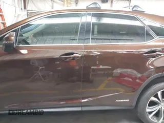 2016 Lexus RX 450h with VIN 2T2BGMCA1GC005462, listed as a IAAI auction lot 42304457 with 87,248 mi miles and . Bid and sale history available at DreamBid. Image 14.