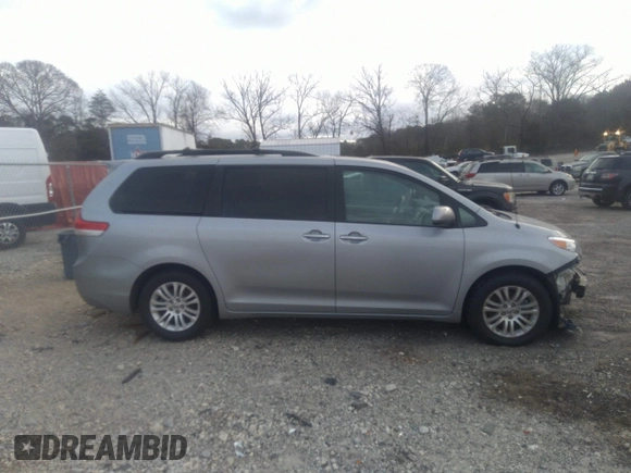 2014 Toyota Sienna XLE with VIN 5TDYK3DC0ES421501, listed as a IAAI auction lot 41672414 with 111,911 mi miles. Bid and sale history available at carsss.com. Image 13.