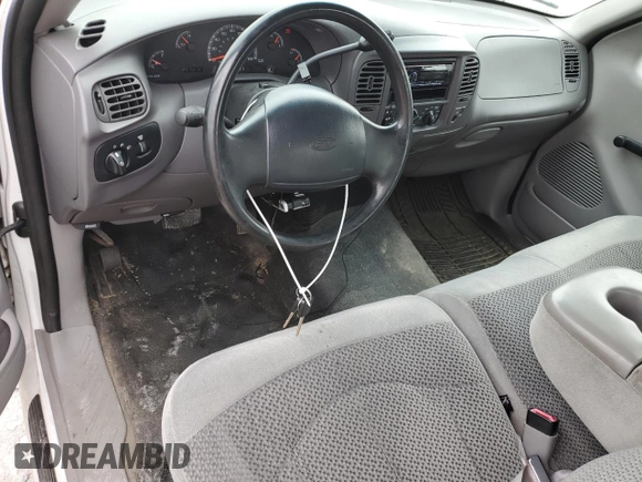 1999 Ford F-150 with VIN 2FTRX17W3XCA68816, listed as a Copart auction lot 53080755 with 201,501 mi miles and Salvage Title. Bid and sale history available at DreamBid. Image 9.