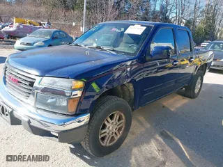 2011 GMC Canyon SLE1 with VIN 1GTH6MFE3B8123808, listed as a IAAI auction lot 41297090 with 142,877 mi miles. Bid and sale history available at carsss.com. Image 14.