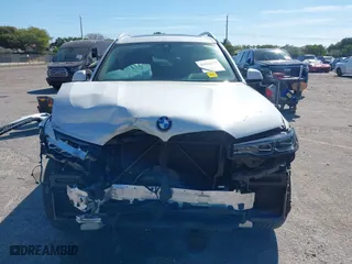2020 BMW X7 xDrive40i with VIN 5UXCW2C00L9A03002, listed as a IAAI auction lot 41856130 with 33,713 mi miles. Bid and sale history available at carsss.com. Image 13.