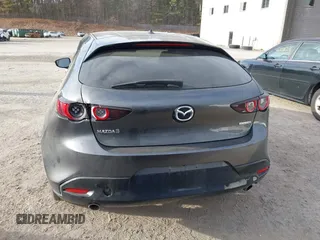 2021 Mazda 3 Premium with VIN JM1BPAML2M1310374, listed as a IAAI auction lot 41190608 with 97,648 mi miles. Bid and sale history available at carsss.com. Image 16.
