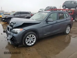 2014 BMW X1 xDrive28i z VIN WBAVL1C51EVY21562, wystawiony jako Copart lot #51627305 z przebiegiem Nie podano mil oraz Szkody całkowita. Historia ofert i sprzedaży dostępna na DreamBid. Obrazek 1.