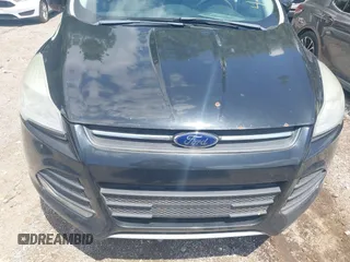 2013 Ford Escape SE with VIN 1FMCU9G95DUC56302, listed as a IAAI auction lot 42553915 with 151,390 mi miles and . Bid and sale history available at DreamBid. Image 6.