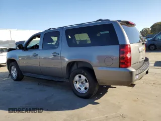 2009 Chevrolet Suburban LT w/2LT with VIN 1GNFK26359J119663, listed as a Copart auction lot 73777444 with 180,851 mi miles and Salvage Title. Bid and sale history available at carsss.com. Image 2.