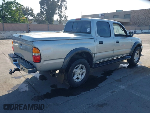 2003 Toyota Tacoma PreRunner z VIN 5TEGN92N63Z152916, wystawiony jako IAAI lot #42153765 z przebiegiem 229 221 mil mil oraz . Historia ofert i sprzedaży dostępna na DreamBid. Obrazek 4.