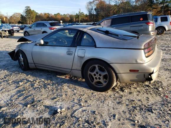 1990 Nissan 300ZX z VIN JN1RZ24A9LX000511, wystawiony jako Copart lot #85093674 z przebiegiem 282 399 mil mil oraz Szkody całkowita. Historia ofert i sprzedaży dostępna na DreamBid. Obrazek 2.