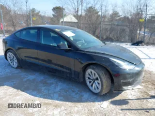 2022 Tesla Model 3 with VIN 5YJ3E1EA1NF304811, listed as a IAAI auction lot 41559342 with 29,597 mi miles. Bid and sale history available at carsss.com. Image 1.