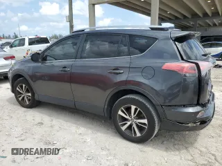 2018 Toyota RAV4 XLE with VIN JTMWFREV1JJ742694, listed as a Copart auction lot 51093695 with 74,502 mi miles and Salvage Title. Bid and sale history available at DreamBid. Image 2.