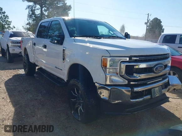 2021 Ford Super Duty F-250 SRW XL with VIN 1FT7W2BT0MED05328, listed as a IAAI auction lot 41744334 with 106,867 mi miles. Bid and sale history available at carsss.com. Image 1.