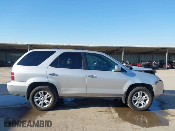 2004 Acura MDX Touring Pkg w/Navigation with VIN 2HNYD18804H546977, listed as a IAAI auction lot 41345964 with 161,856 mi miles. Bid and sale history available at carsss.com. Image 13.