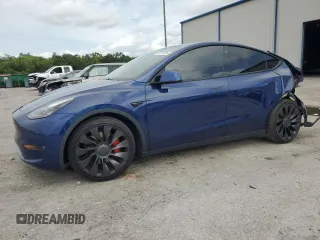 2022 Tesla Model Y Performance with VIN 7SAYGDEF2NF377637, listed as a Copart auction lot 59381695 with 39,230 mi miles and Salvage title. Bid and sale history available at DreamBid. Image 1.