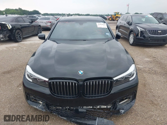 2017 BMW 7 Series 740i z VIN WBA7E2C36HG741092, wystawiony jako IAAI lot #42029625 z przebiegiem 60 389 mil mil oraz . Historia ofert i sprzedaży dostępna na DreamBid. Obrazek 12.