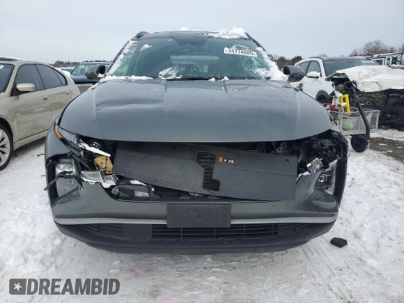 2022 Hyundai Tucson SEL z VIN 5NMJBCAE5NH154804, wystawiony jako Copart lot #44774885 z przebiegiem 61 052 mil mil oraz Szkoda całkowita • Salvage title. Historia ofert i sprzedaży dostępna na DreamBid. Obrazek 5.