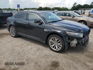 2013 Ford Taurus Limited with VIN 1FAHP2F84DG136769, listed as a Copart auction lot 60990765 with 228,994 mi miles and Salvage title. Bid and sale history available at DreamBid. Image 4.