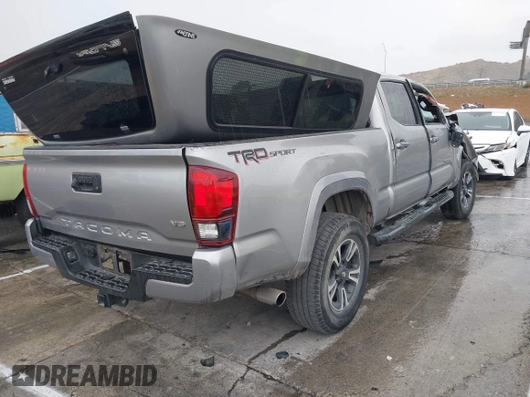 2018 Toyota Tacoma SR5 with VIN 3TMBZ5DN0JM012259, listed as a IAAI auction lot 41709709 with Not provided miles and . Bid and sale history available at DreamBid. Image 4.
