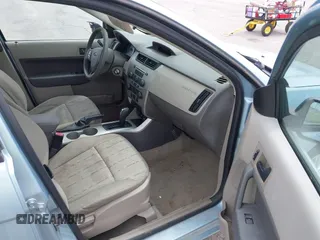 2009 Ford Focus SE with VIN 1FAHP35N59W157060, listed as a IAAI auction lot 41871757 with 141,558 mi miles. Bid and sale history available at carsss.com. Image 5.