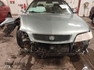 1999 Acura CL Premium z VIN 19UYA2256XL004617, wystawiony jako IAAI lot #41600686 z przebiegiem 262 871 mil mil oraz . Historia ofert i sprzedaży dostępna na DreamBid. Obrazek 6.