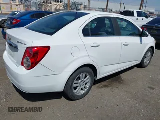 2014 Chevrolet Sonic LT with VIN 1G1JC5SH9E4212898, listed as a IAAI auction lot 41852112 with 121,382 mi miles and . Bid and sale history available at DreamBid. Image 4.